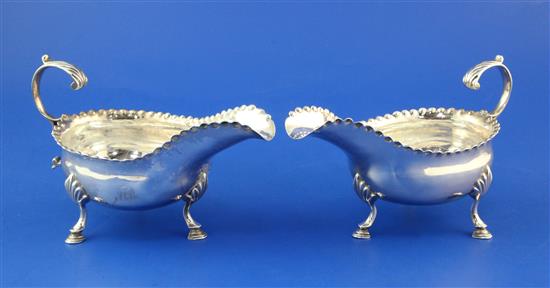 A pair of George III silver sauceboats by William Cattell, 9.5 oz.